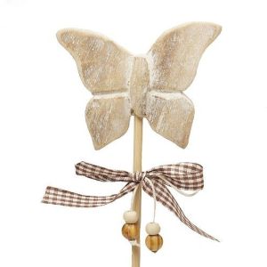 Motyl na drewnianym stojaku